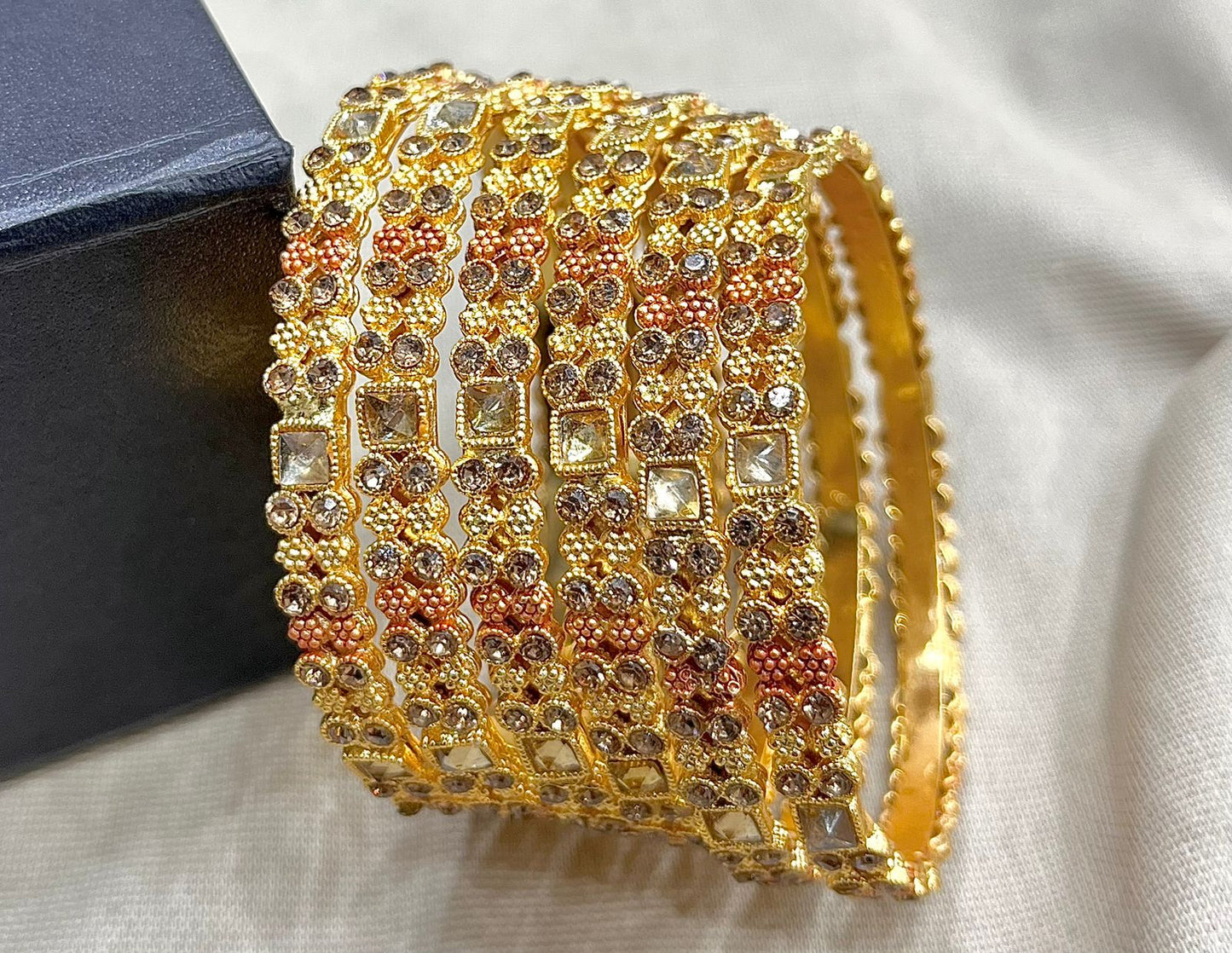 Gold Bangle (White stones)